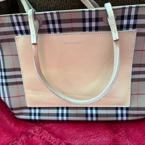 Burberry GUC tote. Beautiful tote with pocket on the front. Couple tiny spots